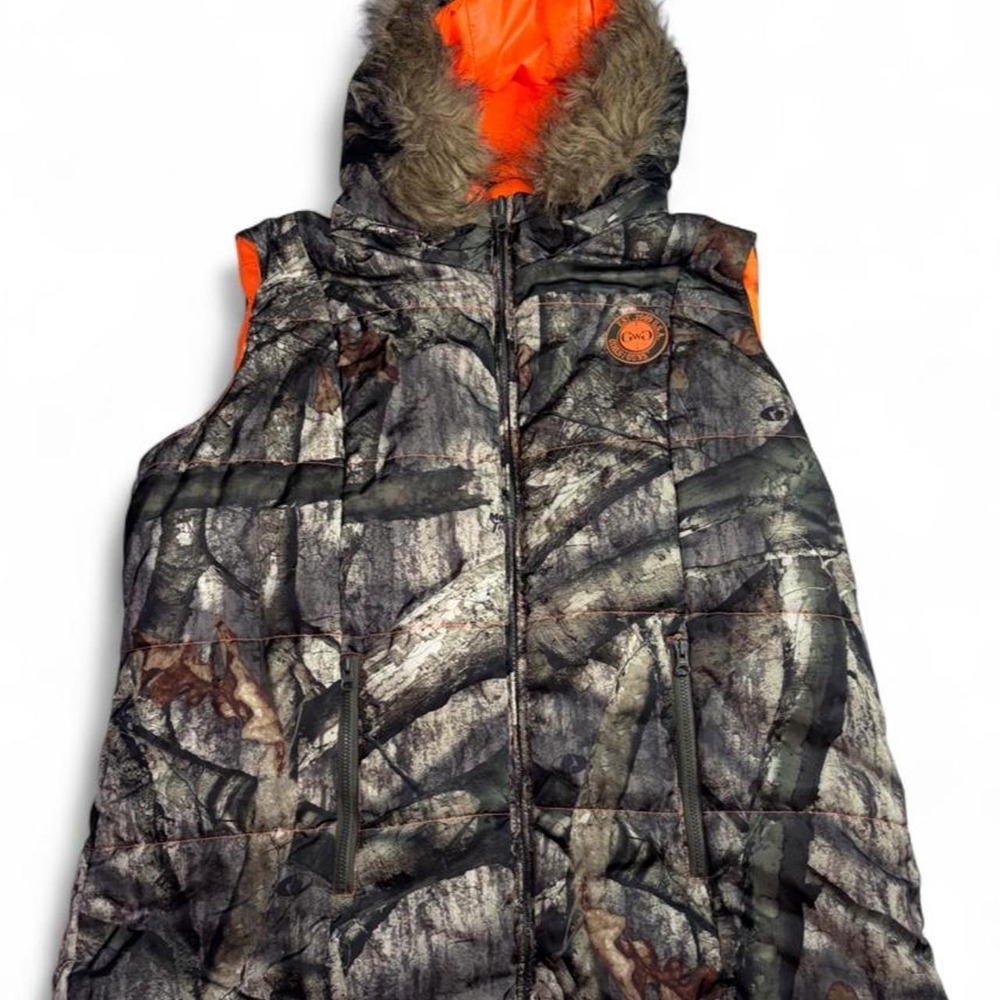 Girls With Guns camo vest with orange lining and fur hood